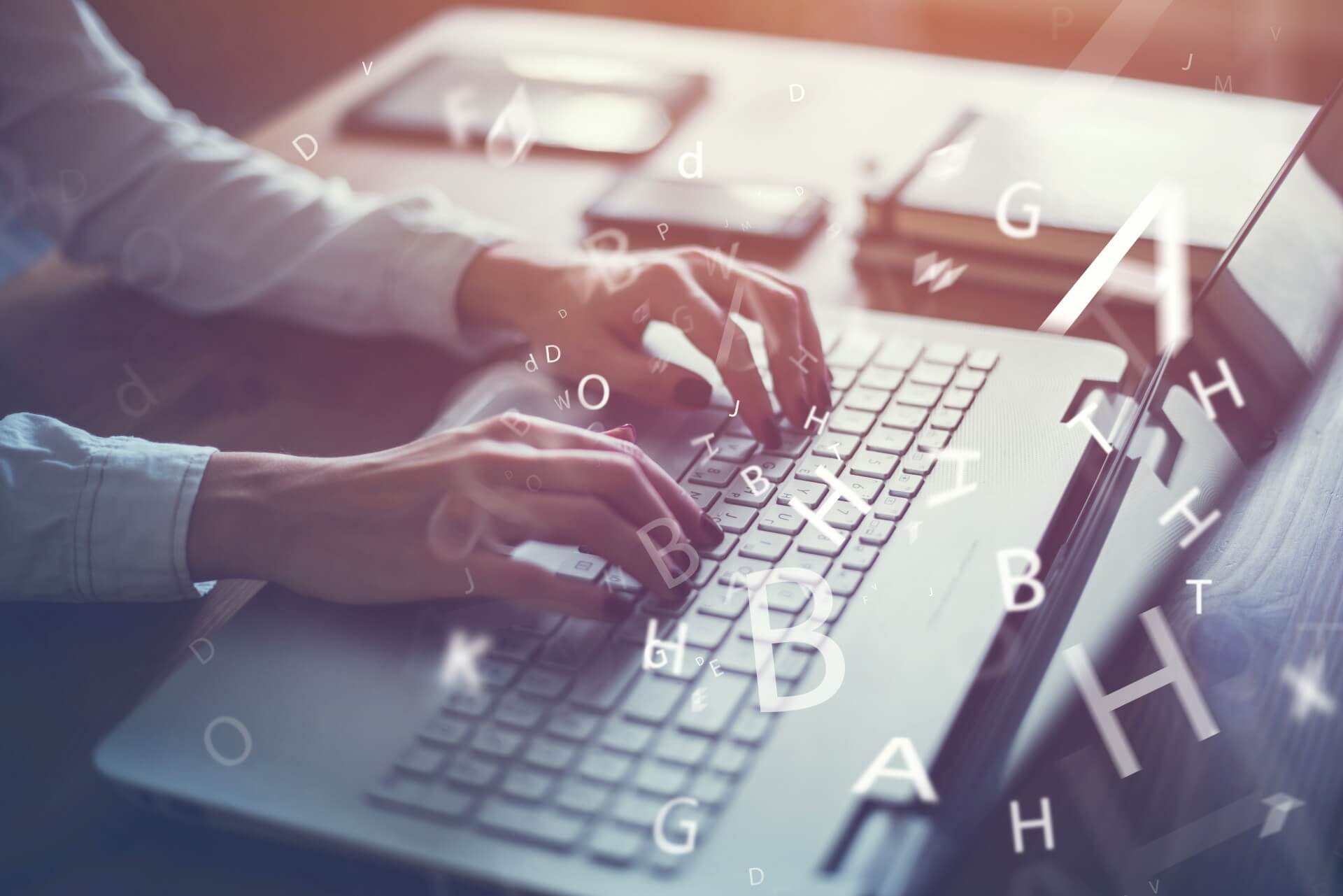 Woman working at home with a laptop