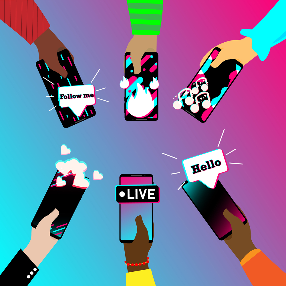 The hands of a diverse group of people are holding a smart phones with symbols of famous social media. Social network illustration Mobile app template. Flat vector illustration. EPS10